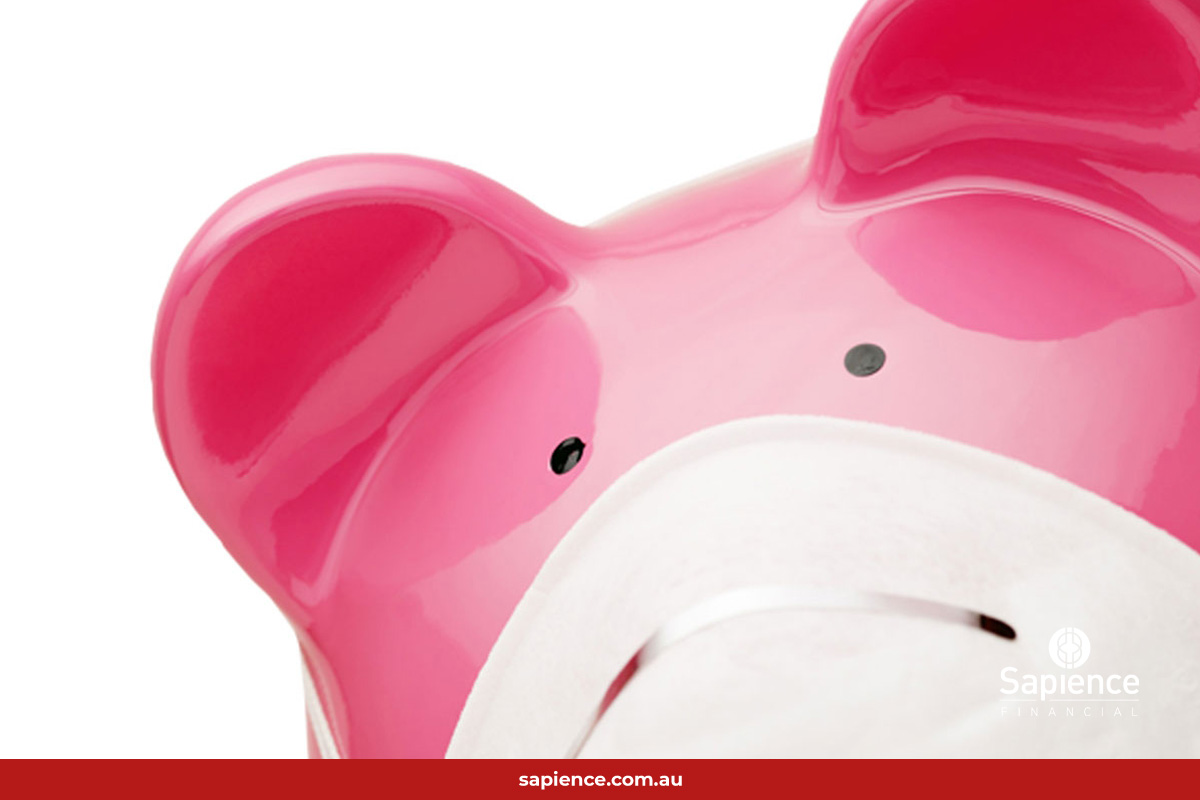 pink piggy bank with face mask