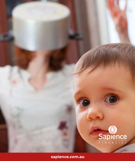 mother with a saucepan over her head watched by a confused baby