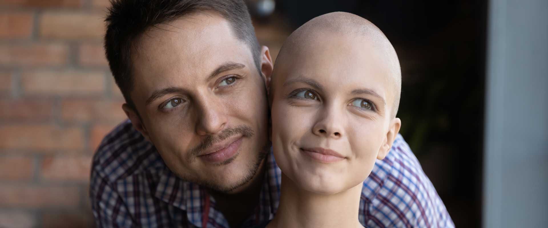husband with his wife living with cancer