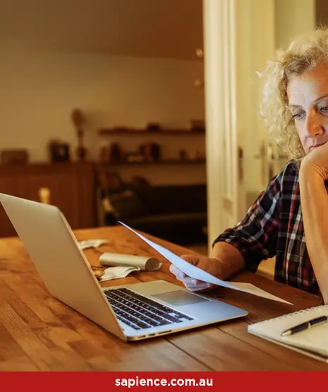 a middle aged women looking at the rental statement